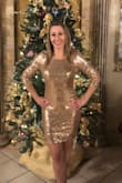 I absolutely loved this dress. I ordered an xsmall but exchanged it for a small. It was fitting but easy to move around in and not too short when sitting. My only complaint was my sleeves kept getting caught on the side of the dress. - Erin