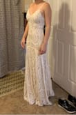 I like the dress, love the overall pale rose/ beige color. It was a bit long, and will need to be tailored if I keep it.
I would love seeing a sleeved option, made of the same lace. I have not made up my mind about whether or not it will be my wedding dress yet. I might get back to it if I don't find anything else much better. At this price point the competition will be tough though!
Thank you Lulus! - Anne-Marie C.