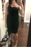 Received a dress with a defective zipper :( but customer service were great and offered me a partial refund to cover cost to have it repaired. The fit is good, the material is thick and is stretchy, it feels a little tight across the hips but I would not order a size up, I ordered a M. Overall, Love this dress for my upcoming work Christmas party! - Amanda H.