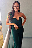 Hello, wore this jumper to a wedding by the ocean in Maine in early October. It was perfect. Was able to wear a scarf when it got chilly at night and during the day the jumper kept me warm. The material is comfortable and elegant. I got plenty of compliments. The jumper has a built in wire that stays tight on your bust to hold them upright and look perky. I was was comfortable all night. I highly recommend this item! - Kendra R.