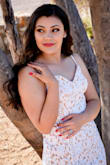 I wore this dress for my graduation photos. It fits perfectly! It is very well made and high quality for the price. Looks very elegant. - Angela C.