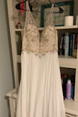 I bought this for my beach wedding next June and couldn't be happier! It's beautifully made, the quality is great and the price is even better. The only thing I need tailored is the length, which I already figured because I'm short, otherwise I can't wait to wear it!! - Megan T.
