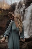 I love this dress in light blue! The sleeve detail and open back with a tie are beautiful. I tried in green at first and just didn't love it. I also sent the small back for an XS and I'm never and XS. I would go off of waist sizing and size down one since the rest is flowy. Plenty of room in the bust area. - Kendra W.