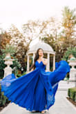 The material is great and the extra layers were perfect for a flowy shoot. I did have it hemmed for a shorter length because I'm far too short even with 4 inch stilettos on. Perfect for an elegant engagement shoot or any event. 
More photos at IG@NaturallySu - Susanna L.