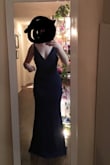 This was a gorgeous dress. Beautiful color and fabric. Unfortunately it didn't fit me because my bust would fit in small and my hips would fit in a large. I could have it taken in in the bust area for my event, but if I gained an inch on my hips (hello holidays right around the corner), it wouldn't fit there anymore. I returned and exchanged for a style with more flexibility around the hip area. I am 5 ft 8.5 in and it was way too long for flats. - Bethany C.