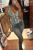 The cut is pretty low, so it's a bit revealing. The material is super soft and comfortable. Can go with just about any type of pants or skirt. - Joanne K.