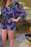 The romper fit well! I left the top buttoned up (as you can see in the pic). It was a littttle short, but keep in mind I have long legs. - Sarah G.
