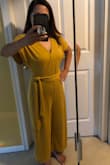 This romper is so comfy! It's a little big on the chest area but I just pinned the opening so it won't show too much. The material is kind of a thick t-shirt, this romper is cute and easy to wear to work but not an outfit if you're attending a wedding because of its material. Looks casual. - Juanita