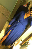 The front needs a safety pin to hold it closed and the slit will have to be sewn down a little. It splits way too high! It is a little big all over but it will work. Wearing it to a company Christmas party. - Brittany S.