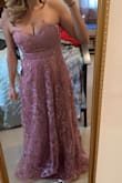 Not very flattering and very long. Material is okay. - Christine B.