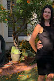 The fabric is nice. Doesn't feel cheap. Is stretch but still holds everything where it needs to be. The skirt goes back up a little bit when you're walking but not bad. I used it for a wedding and it was very comfortable and flattering! - Milena B.