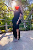 This gown exudes elegance and classy sexiness! I wore this to my friends wedding and received many compliments, the velvet belt gives such a beautiful touch and it definitely hugs the body in the right places. I wore 4" inch heels to accommodate the length of dress! - Bernardette P.