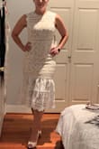 Dress is well made and the fabric is thick. It seems to be well made. I ended up returning it because it wasn't what I had in mind for my birthday celebration. - Sharon V.