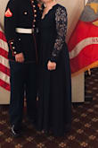 Loved this dress! Wore it to a Military Ball and it was perfect for the occasion. I got a medium but I am a little short so I got an inch and a half taken off the bottom. I wore 1 inch heels and it wasn't too short. It fit a little loose on top but I wouldn't have changed it too much. - Isabella T.