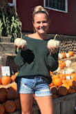 I love the length and fit of this sweater. It's got a little bit of balloon sleeves, an open back on the top with crosshatching and great material all around. I wore this for a lot of fall/winter outfits for at work and at home. It can be dresses up easily or down. - Lacey L.