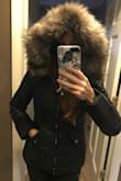 LOVE this coat! I was unsure about buying it since there were no reviews yet but I am so happy I took the chance. It looks and feels high quality. It has a little snap on the hood so it snaps close under your chin. - Sarah P.