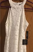 I bought two pieces for my wedding shower and ended up not wearing this one. It's absolutely beautiful, but I have no reason to keep it. Still has tags attached and no blemishes whatsoever. It's actually been hanging on my closet door since the day I got it in the mail. - Majestee H.