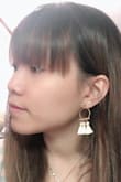 I hesitated to buy this pair of earrings because I used to try wearing tassel earrings before and they didn't look good on me. But these do look good on me, not too big and not too small. Also, their colors match with lots of outfits. Glad I got them. - Hoang L.