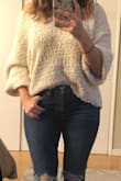 I really like the sweater,It's roomy so I would absolutely size down or select your normal size if you don't mind an oversized sweater. It felt very comfortable to wear - LAUREN M.