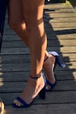 Very tall heels, pretty material and comfortable, would like if the ankle strap went a little tighter though. - Brenna R.