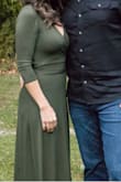 The dress is excellent quality and very slimming - I wore it a few months after having twins and felt great. I should've gone an extra size up but it still looked good. - ANITA L.