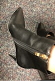 I ordered these booties in black. I went with the other reviewers advice and ordered a size down. I usually wear a size 6, and the size 5.5 fit perfectly. I want to love these booties, but there are a few cons. One was the booties came with an odd strong scent that wouldnt go away for about a week. I had a headache wearing them until the scent went away. Also, the material is cheap. After wearing them only at work for about a week (I work a desk job so I do very minimal walking), the booties already appear to be scuffed. I would give these booties 3/5 stars, as they are cute and comfortable (just cheaply made) but hey, you get what you paid for! - Diana P.
