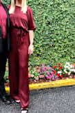 I purchased this jumpsuit for my cousin's rehearsal dinner in November and love it! It fits perfectly and can't wait to wear it! The color is so pretty and seems just right for Fall weather - Casey T.