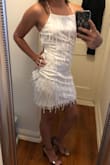 I just love how this dress is so open in the back and the little details on it are super adorable. I can't wait to wear this on NYE! - Carrie G.