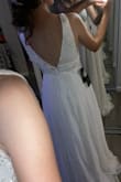 It's beautiful. A bit too fancy for my rehearsal dinner/welcome party for my destination wedding, which is what I purchased it for. Would have almost worked perfectly for a wedding dress. I like it so much I'm gonna keep it and figure out where I could wear it. I'm having a second reception in my hometown after my destination wedding, I think I'll wear this to that. - Shannon L.
