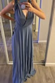 I ordered and XS but it still felt big. Would be super cute if it was fitted. Tapping holds up the shoulders well. Would recommend sizing down. - Shannon L.