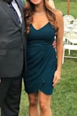 Got so many compliments on this dress. The color is really pretty, it's a bit more blue-green than it is emerald, very similar to the pic. I wanted something to flatter me after having a baby and this dress felt very flattering and thick material, great quality, straps are sturdy. Highly recommend! - Bridget F.