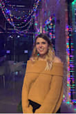 Very cute sweater and looks great in photos, but I felt like the material was a little thick and the sleeves were long. Maybe size down? I was happy with the length but I'm not sure if I would wear it more than once or twice - Samantha S.