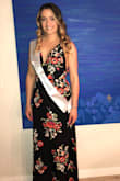 I've worn this dress for various events and it has been a hit each time. The back is really gorgeous the way it comes together in the back and helps secure the girls if you are not wearing a bra. The waist is tapered in the right spot and the drop of the dress makes your legs look a mile long :) - Camille P.