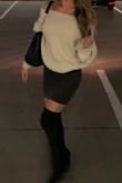 Material is thick and cozy. It has a nice stretch to it too so it stays down around shoulders easily. I Love it! - Katie M.