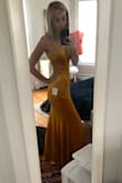 I was actually really surprised at how nice this dress is, it fits perfectly. I'm 5'10" and it hits the floor so this would need to be hemmed on someone short. I was worried about how the yellow would look in person but it's awesome. Only thing I don't love is how static it gets, but that can be fixed. Usually I would go for a medium but I'm glad I got a small. Overall love it. - Heather B.