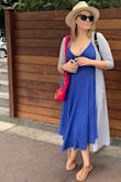 I wore this dress on a trip to Mexico paired with a long cardigan. I ordered the large because some of the reviews said that it may run a little small and I'm glad I did! Definitely size up if you are on the fence and if you have a larger bust. I had to re-adjust the straps a couple of times because my bust was a little heavy for it. If your bra size is larger than a 38C then proceed with caution. Even with the strap issues, I recommend this dress because it is very flattering! - Joanna L.