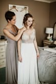 I loved this dress when I first saw it online and it surpassed my expectations in person. My only complaint was that the pads sit a bit high for me so I had to wear a sticky bra. Otherwise it was perfect! - Brittany J.