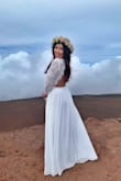 I wore this dress on our engagement shoot and it was so perfect! I got so much compliment from it. The material is really nice and flowy and it also kept me warm at the top of Haleakala. - Kerlyne U.