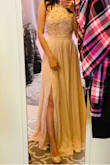 Like other Lulus products, the dress has a nice fabric and color. It is also pretty but it is SUPER long. I know I am not as tall as the model but with this dress, you will still be... mopping the floor even if you are 5'10". I am gonna get it trimmed so hopefully it would work out for my gala. Otherwise I am not sure if I would be able to walk in it. I wish they would make these dresses a little shorter! - Thao L.