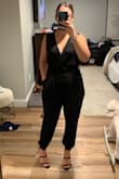 Bought this jumpsuit for a cocktail attire event. This is the only picture I could find of full piece. For shorter girls (like me) it's a little long but wore with heels so that helped. The top with very low cut due to criss-cross fabric. With a plunging bra and some body tape, everything stayed in place! Would recommend! Got lots of compliments and very comfortable, light weight fabric. - Jen O.