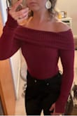 8/10.
I wish the top part was sewn down or something. The top rolls up when I move my arms and it has a permanent roll to the edge from rolling up so often. Maybe I needed to size up, but I like fitted sweaters. - Michelle M.