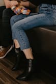 Contrary to what others said, this boots are true to size for me. Not painful at toe area at all. I'm a... initially ordered 7.5 but it was too big. Got 7 instead and it was perfect! Classy bootie for a fraction of a price. - MARIE D.