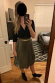 Slightly loose in the waist, but still looks fitted. I added a belt from Amazon. - Kara F.