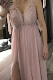 I'm very happy with this dress. I normally wear a medium but have come to find most mediums are too long even with heels and i'm already tall so I took a chance with the small. It's the perfect length and fit except a tad snug around the top but still wearable. - Erica S.