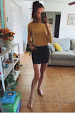 I have a hard time finding shirts that fit. I have a tiny waist and most skirts fit awkwardly with a gap around my tummy. This one fits a little loose, but I like the overall look. Will be pairing it mostly with tops that I can tuck in. I have long legs and the length is perfect! - Aleksandra K.