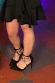 Classy and fun and versatile. I put gel pads in the bottom because I don't wear heels often. My feet were a bit sore after 4 hours or so of standing, but I will definitely wear these again. I normally wear a 7.5 to 8 and the 7.5 was slightly big on me. - Paige B.