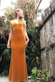 I ordered this as a bridesmaids dress and I am so happy with the fit! I'm taller and have a smaller bust with wider hips, so sometimes a good fit is hard for me. The material is super soft and has a nice stretch to it that gives my hips more room. I ordered a small and think that was the best choice for me since I'm not very busty. Love the color, it feels elegant and I can't wait to wear it! - Emily E.