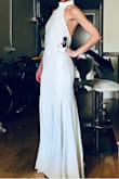 The dress is gorgeous, but runs small. I think a medium will be too big so I'm going to have it let out a smidge and wear it for my rehearsal dinner. - Brooke B.