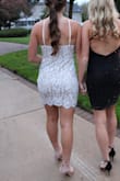 This dress was gorgeous! Very simple yet so pretty! Was a bit baggy in the back, but took it in slightly and it fit great! - Avery C.