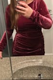 I ordered a medium and it fits very well. The ruching is beautiful and adds a little bit of coverage in the stomach area. I found this dress to be flattering on my body, as I have larger hips and bust. I will be wearing this to many holiday events this year. It is exactly what I was expecting. It is a good length on a shorter person and is flattering even if you don't have a perfectly flat stomach. - Mariah G.